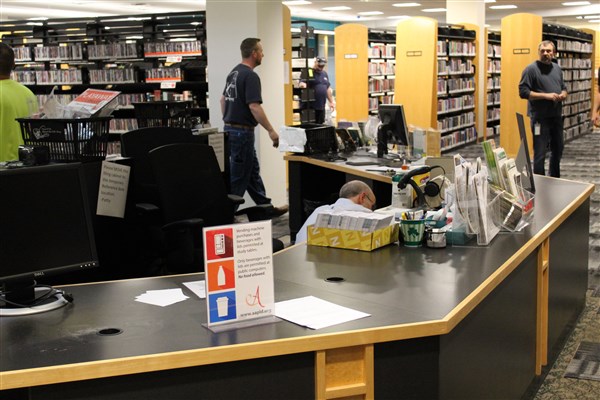 Beginning work to take down Adult Services Desk