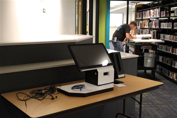Temporary location for Adult Services self check